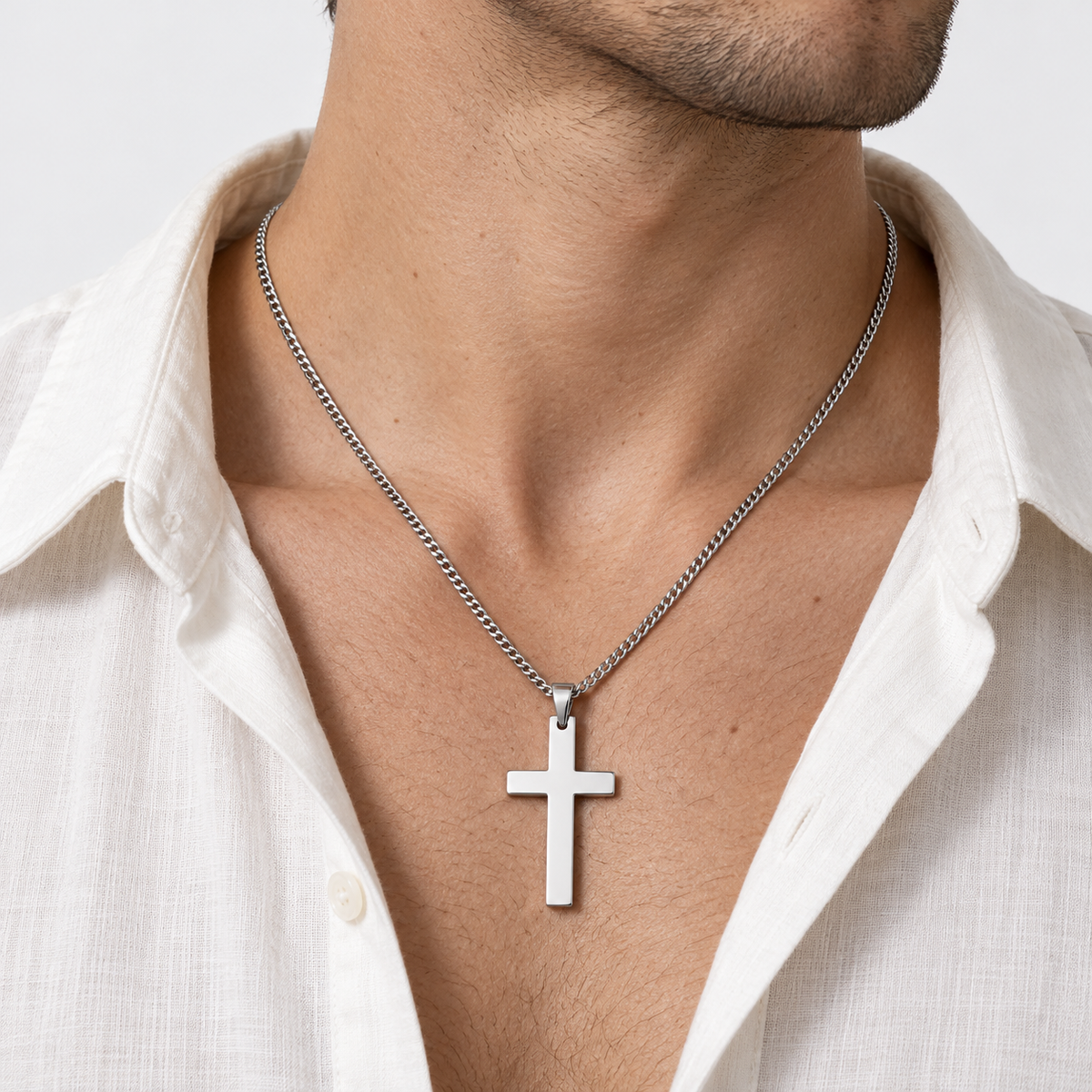 Greyford Roma Cross Pendant Necklace — worn by a model, close-up studio photograph