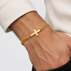 Greyford Assisi Cross Chain Bracelet — worn by a model, close-up studio photograph