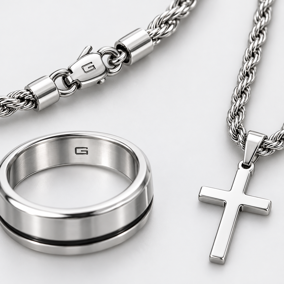 Greyford Siena Cross Necklace Bracelet and Ring Set — close-up of the piece and brand engraving