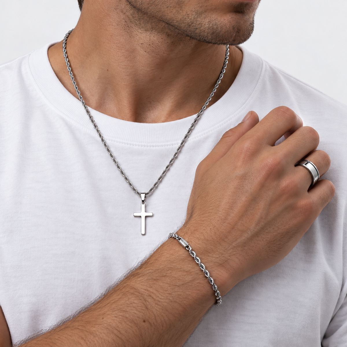 Greyford Siena Cross Necklace Bracelet and Ring Set — worn by a model, close-up studio photograph
