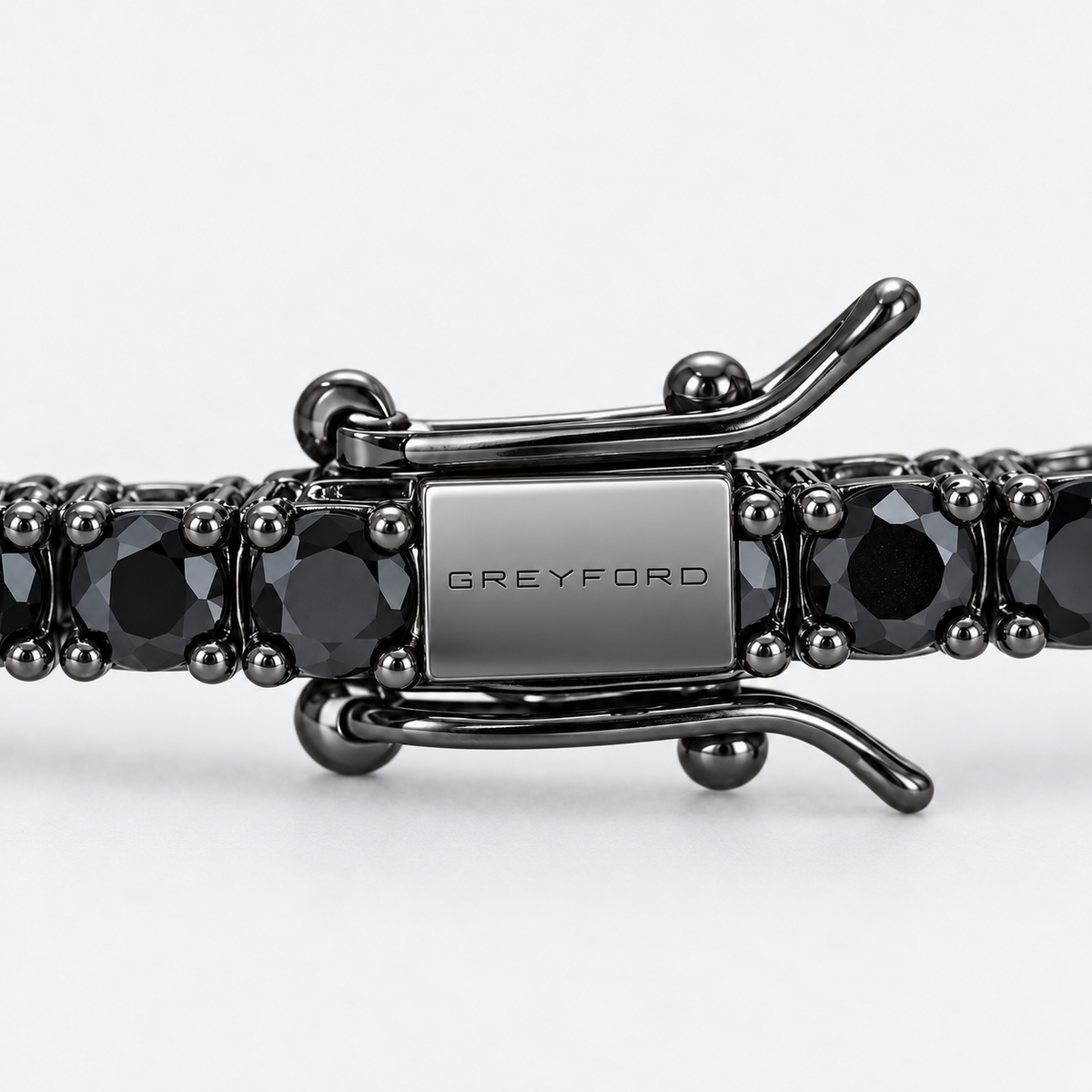 Greyford Berlin Black Cubic Zirconia Tennis Bracelet — close-up of the piece and brand engraving