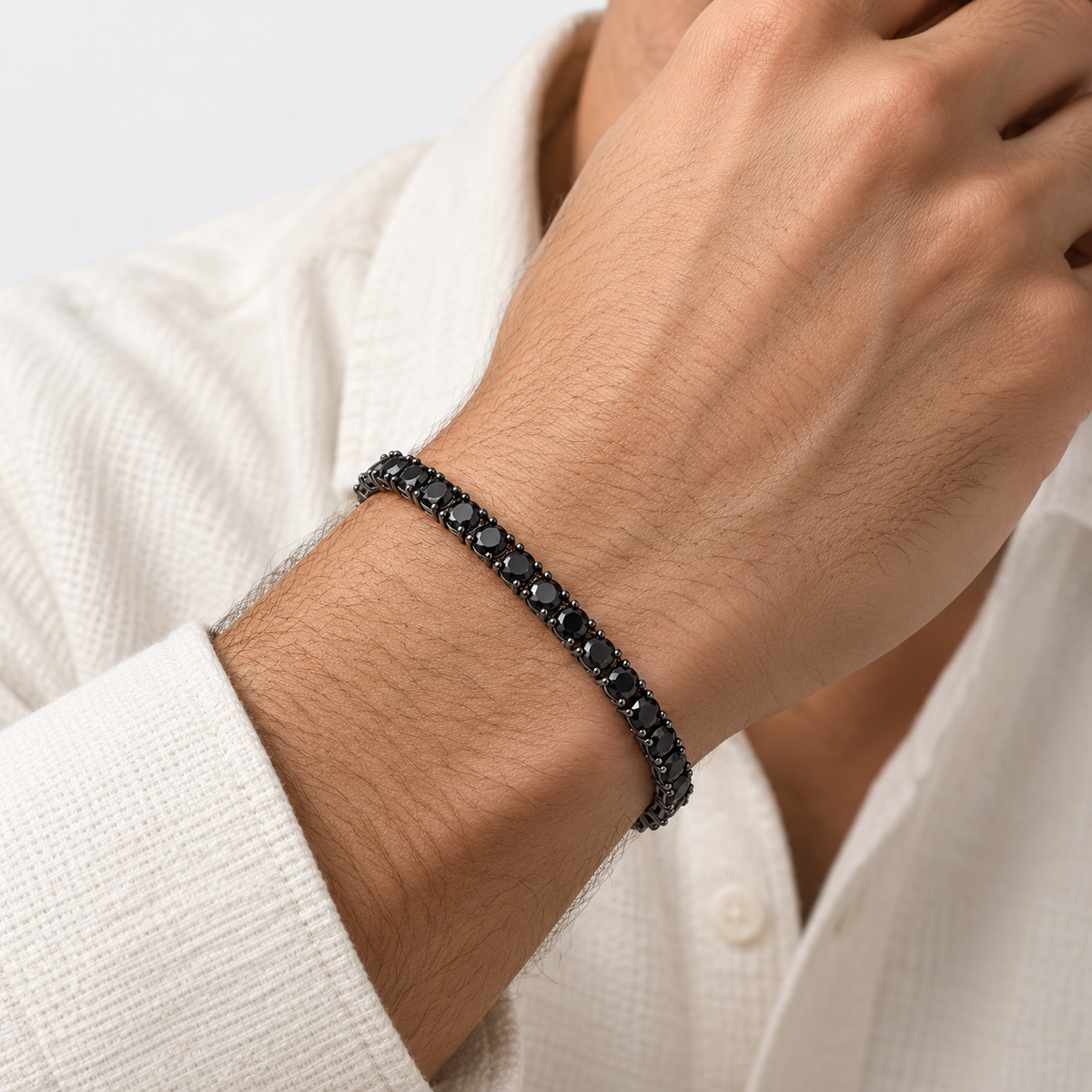 Greyford Berlin Black Cubic Zirconia Tennis Bracelet — worn by a model, close-up studio photograph