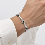 Greyford Dublin Black Clover Tennis Bracelet — worn by a model, close-up studio photograph