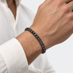 GREYFORD Moissanite Tennis Bracelet | Black 925 Silver — worn by a model, close-up studio photograph