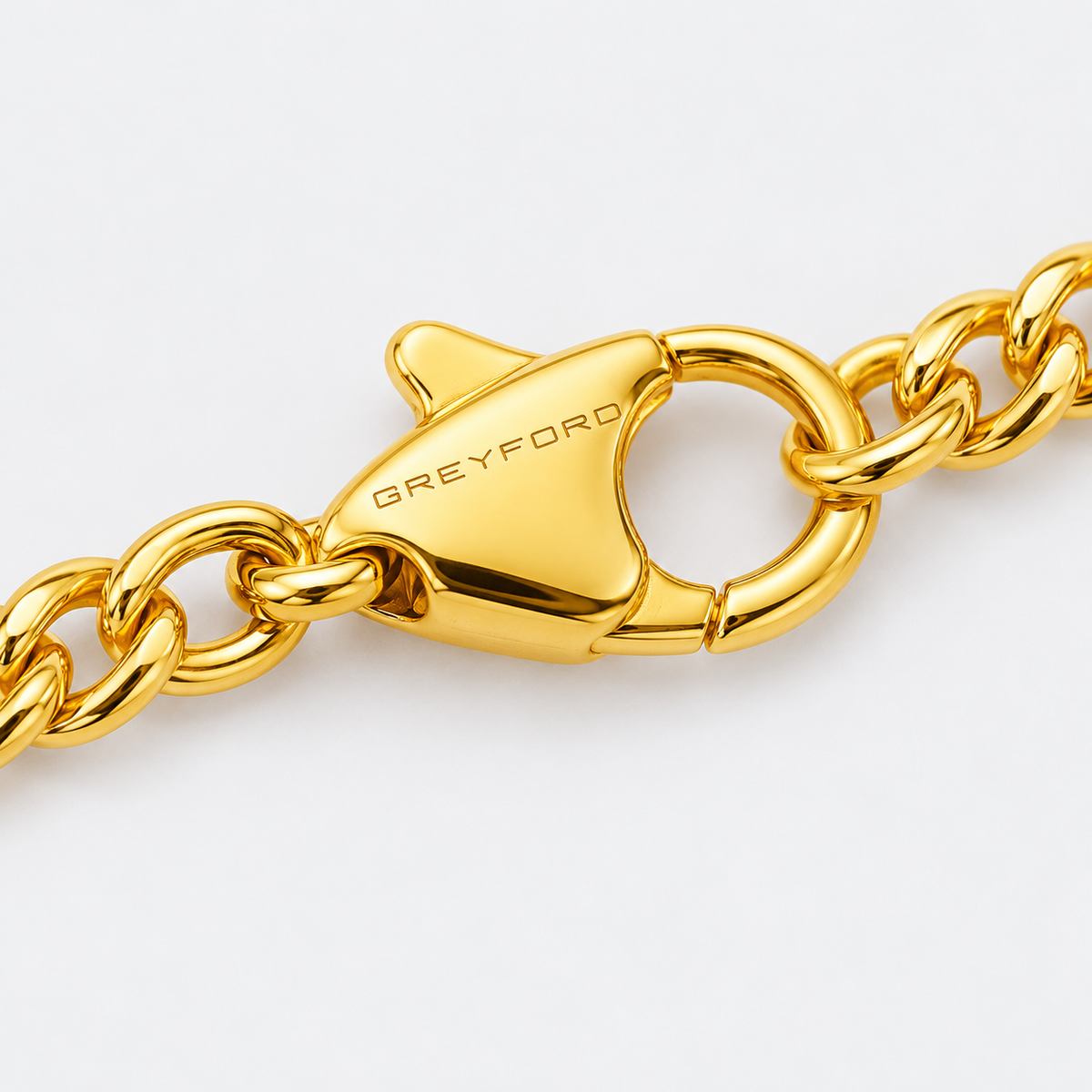 Greyford Santorini Fine Cross Bracelet — close-up of the piece and brand engraving