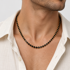 Greyford Ibiza Round Black Stone Necklace — worn by a model, close-up studio photograph