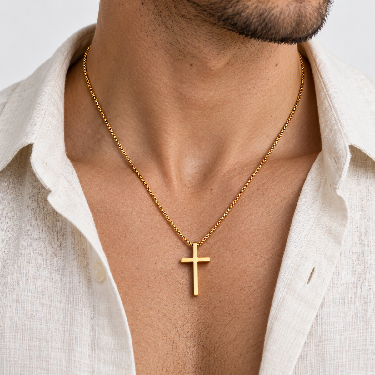 Greyford Verona Cross Pendant Necklace — worn by a model, close-up studio photograph