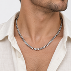 Greyford Milan Curb Chain Necklace — worn by a model, close-up studio photograph
