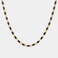 Greyford Capri Black and Gold Station Necklace — studio product photograph