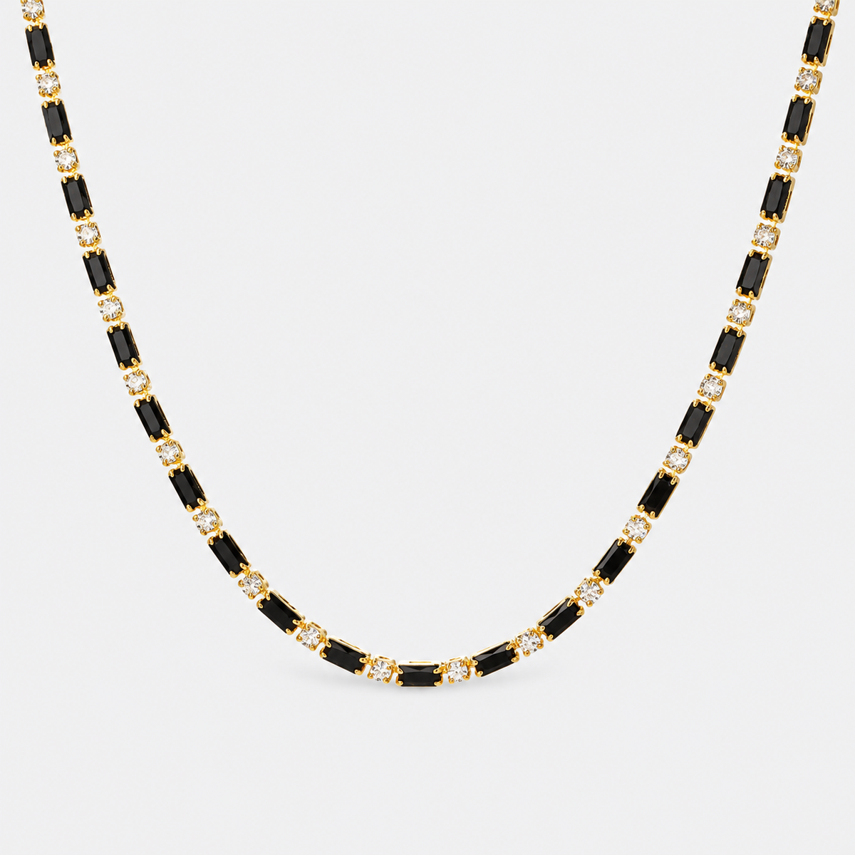 Greyford Capri Black and Gold Station Necklace — studio product photograph