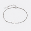 GREYFORD Minimal Cross Bracelet — studio product photograph